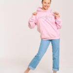 Abby Miller Instagram - The holidays are right around the corner and the Abby Lee Dance Company has you covered! Head over to store.abbyleedancecompany.com or in person @aldcstudiola for some amazing merch including this super cute baby pink rhinestone hoodie 🎀 Los Angeles, California