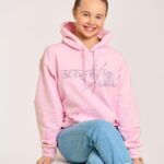 Abby Miller Instagram - The holidays are right around the corner and the Abby Lee Dance Company has you covered! Head over to store.abbyleedancecompany.com or in person @aldcstudiola for some amazing merch including this super cute baby pink rhinestone hoodie 🎀 Los Angeles, California