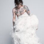 Achille Lauro Instagram – • Creative Director: @directedbyachillelauro
Sono il Punk Rock.
Icona della scorrettezza.
Purezza dell’anticonformismo.
Politicamente inadeguato.
Cultura giovanile.
San Francesco che si spoglia dai beni,
Elisabetta Tudor che muore per il popolo.
Giovanna D’Arco che va al rogo.
Prometeo che ruba il fuoco agli dèi.
Sono un bambino con la cresta,
Un uomo con le calze a rete,
Una donna che si lava dal perbenismo e si sporca di libertà.
Sono l’estetica del rifiuto,
Il rifiuto dell’appartenenza ad ogni ideologia.
Sono Morgana che tua madre disapprova.
Contro l’omologazione del “si è sempre fatto così”.
Sono Marilù.
Dio benedica chi se ne frega.

I am Punk Rock.
Icon of impropriety.
Purity of anti-conformism.
Politically inadequate.
Youth cuture.
Saint Francis who rids himself of possessions, 
Elisabeth Tudor who dies for her people.
Joan of Arc burnt at the stake.
Prometheus who robbed the gods of fire.
I am a child with a crest,
A man in fishnet stockings,
A woman who washes herself of respectability and dirties herself with freedom.
I am the esthetics of refuse
The refusal of belonging to any ideology.
I am Morgana whom your mother disaproves. 
Againts the standardisation of “it’s always been done this way”.
I am Marilù.
God bless those who don’t give a damn.

Costume Design: @alessandro_michele @gucci 

Co-creative Director: Nicolò Cerioni 

Fotografia: @LeandroEmede

@guccibeauty
