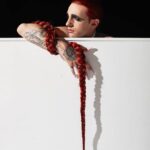 Achille Lauro Instagram - • Creative Director: @directedbyachillelauro Sono il Rock 'N Roll. Trasgressione che entra nelle case di mezza America. Esplicito invito a lasciarsi andare. Una vecchia chiesa indignata per il credo dell'irriverenza. Nuovo tempio notturno del giovane e del proibito. È tempo di gioco. Demonio, divinità, Jukebox tappezzati di chiodi. Unione rituale con gli altri In un solo corpo danzante. Carne che chiede carne. Uragano nei desideri sessuali, Scossa nel perbenismo familiare, Promessa di piacere. Il sacro vincolo del godimento. Godere è un obbligo. Dio benedica chi gode. I am Rock ‘n' Roll. Transgressions entering houses all over America. An explicit appeal to let yourself go. An old church indignant over the irreverent beliefs. A new night temple of youth and the forbidden. It's time to play. Demon, divinity, Nail covered Juke Box. Ritualised union with others In a single, dancing body. Meat asking for meat. Hurricane of sexual desires, Family respectability shocked. The promise of pleasure The sacred bond of pleasures. Pleasure is a duty. God blesses those who take pleasure. Tributo a Mina, donna dal vero animo Rock 'N Roll, e all'iconica foto scattata da Mauro Balletti nel 1984 Costume Design: @alessandro_michele @gucci Co-creative Director: Nicolò Cerioni Fotografia: @LeandroEmede @guccibeauty