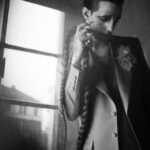 Achille Lauro Instagram - • Creative Director: @directedbyachillelauro Sono il Rock 'N Roll. Trasgressione che entra nelle case di mezza America. Esplicito invito a lasciarsi andare. Una vecchia chiesa indignata per il credo dell'irriverenza. Nuovo tempio notturno del giovane e del proibito. È tempo di gioco. Demonio, divinità, Jukebox tappezzati di chiodi. Unione rituale con gli altri In un solo corpo danzante. Carne che chiede carne. Uragano nei desideri sessuali, Scossa nel perbenismo familiare, Promessa di piacere. Il sacro vincolo del godimento. Godere è un obbligo. Dio benedica chi gode. I am Rock ‘n' Roll. Transgressions entering houses all over America. An explicit appeal to let yourself go. An old church indignant over the irreverent beliefs. A new night temple of youth and the forbidden. It's time to play. Demon, divinity, Nail covered Juke Box. Ritualised union with others In a single, dancing body. Meat asking for meat. Hurricane of sexual desires, Family respectability shocked. The promise of pleasure The sacred bond of pleasures. Pleasure is a duty. God blesses those who take pleasure. Costume Design: @alessandro_michele @gucci Co-creative Director: Nicolò Cerioni Fotografia: @LeandroEmede @guccibeauty