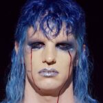 Achille Lauro Instagram - Sono il Glam rock. Sono un volto coperto dal trucco. La lacrima che lo rovina. Il velo di mistero sulla vita. Sono la solitudine nascosta in un costume da palcoscenico. Sessualmente tutto. Genericamente niente. Esagerazione, teatralità, disinibizione. Lusso e decadenza. Peccato e peccatore, Grazia e benedizione. Un brano che diventa nudità. Sono gli artisti che si spogliano, E lasciano che chiunque Possa spiare nelle loro camere da letto e in tutte le stanze della psiche. Esistere è essere. Essere è diritto di ognuno. Dio benedica chi è. I am Glam rock. I am a makeup covered face. The tear which ruins it. The veil of the mistery of life. I am loneliness hidden by a stage costume. Sexually, everything. Generically, nothing. Over the top, theatrical, uninhibited. Luxury and decadence. Sin and sinner, Grace and blessing. A tune turning to nudity. It is artists who undress, And let anyone Spy into their bedrooms and all the rooms of their minds. Existing is being. Being is everyone's right. God bless who is. • Creative Director: @directedbyachillelauro Costume Design: @alessandro_michele @gucci Co-creative Director: Nicolò Cerioni Fotografia: @LeandroEmede @guccibeauty