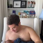 Adam Devine Instagram - This new age dad is heading to ATLANTIC CITY at the HARD ROCK CASINO for @podimportant LIVE!!! April 19th! See you there and fellas let’s express these ta ta’s! Link in bio to get them tix! ** THIS IS A JOKE. He’s not actually sucking my nips. Chill.