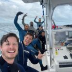 Adam Devine Instagram - Wow! It’s shark week again on @discovery. I absolutely love shark week and this year they let me take @ders808 and @blakeanderson to the Bahamas to unveil one of the largest congregations of Tiger Sharks in the world. Last year my boy @draustingallagher and I tagged a tiger shark in the Bahamas. We tracked it all year, it all the way to Canada and back to within 100 yards of where we tagged it! It’s truly a shark party!