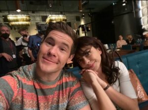 Adam Devine Instagram - Bumper in Berlin is streaming on @peacocktv now! Check out me and my tv work wife @sarahhyland being song and dance people! #bumperinberlin