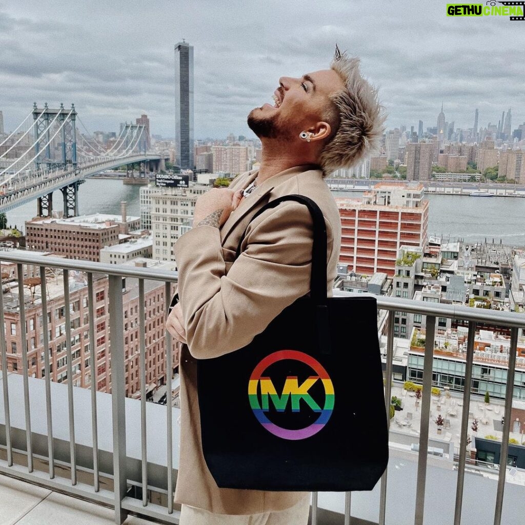 Adam Lambert Instagram - Support the @stonewallvisctr as we preserve LGBTQ+ history, honor the pioneers of the past, and ignite inspiration for the future. Starting June 20, claim your piece of history with the incredible Michael Kors x SNMVC bag at select Michael Kors locations 🌈 Dive into an immersive preview of the upcoming Stonewall National Monument Visitor Center, opening its doors in 2024. Every purchase fuels the SNMVC's transformative work. Discover more at @stonewallvisctr ✨ #MeetUsAtTheMonument