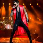 Adam Lambert Instagram – Some of my favorite past looks from tour…got some fun outfits up my sleeve for this next one 😉 @officialqueenmusic @brianmayforreal @rogertaylorofficial 

📸: Miriam Alster, Dana Zuk, Andrew Chin, qoatg, and Frank Hoensch