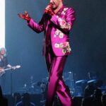 Adam Lambert Instagram – Some of my favorite past looks from tour…got some fun outfits up my sleeve for this next one 😉 @officialqueenmusic @brianmayforreal @rogertaylorofficial 

📸: Miriam Alster, Dana Zuk, Andrew Chin, qoatg, and Frank Hoensch