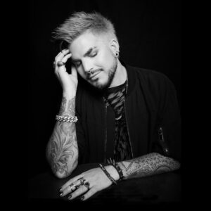 Adam Lambert Instagram - I’m taking a moment for mental health with @takeamoment.uk @theartofldn and @piccadillylights
 
Join me to raise awareness.  Here’s how you can be part of the art:
 
1 )Take an eyes closed selfie 
2) Upload it to Takeamoment.uk
3) Share on Instagram or TikTok
4) Tag @piccadillylights with #takeamoment2023
 
#mentalhealth #mentalhealthawareness