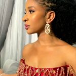 Adesua Etomi-Wellington Instagram - What the song says 🤭 Make up: @t.alamodebeauty Stylist: @dahmola Dress: @sevondejana Jewelry/bag: @pinkperfection_accessories Hair: @tinavalty