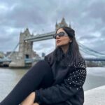 Ahana Kumar Instagram - London dump ( only me edition 🤭 ) Oh oh also , London Vlog out now. Made it with so much love. It’s up on the channel ♥️ lil note on each pic : 1 - in front of Harrods 2 - chilling besides Tower Bridge 3 - eating strawberries and chocolate at Borough Market 4 - Queen’s Home , Greenwich 5 - City Lights Open Deck Bus Tour 6 - Sphagetti Bolognese & Sicilian Lemonade from Sphagetti House 7 - Solo Afternoon Tea Date at Chesterfield Mayfair Hotel 8 - Hyde Park on New Years Day 9 - Amidst the pretty lit up trees at South Bank 10 - Some Mirror near Covent Garden Oki Bye 😘 #LovedLondon ✨