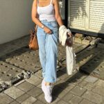 Ahsaas Channa Instagram - 🫧🧸⛅️🎀 Channelling my Shilpa Shetty energy from auzaar Bag @house_of_reecee Top @urbanic_in Jeans @bluebrew.in Shoes @adidasoriginals