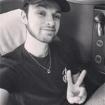 Alastair Aiken Instagram - Posting this 30,000ft in the air ✈️, as I’m mid-flight from the UK ➡️ US for a secret gaming project! 👀🎮 Can anyone guess which game it is...? 🤔