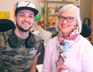 Alastair Aiken Instagram - Happy Mother’s Day! 🙌🏻💙 Who’s seen me and my Mum WIN a game of Fortnite? 😝 Thanks to @vodafoneuk for challenging me to train #FamilySquad, to impress their kids with new gaming skills. My Mum certainly impressed me! 😄🎮 #ad