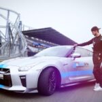 Alastair Aiken Instagram - THIS WAS AWESOME! 😱 So I got to race around the Nurburgring in Germany with @DoritosUK, testing my racing skills in REAL LIFE vs my time in Forza Motorsport 7 on the BRAND NEW Xbox One X! 🏎💨 Which one was quicker...? Find out on my channel now! 😎🎮 #PlayBold #ForzaMotorsport7 #XboxOneX #Ad Nürburgring