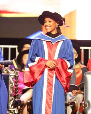 Alex Scott Instagram - Took mama to uni with me 🖤

Thank you @officialqmul for awarding me an Honorary Fellowship for invaluable contribution to the world of sport, social purpose and inclusion… what a special day.

Slide 6: my friend Sarah graduated from the university 25 years ago, I was with her Celebrating her special day, fast forward to the present she came to celebrate with me 🥰