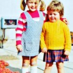 Amanda Holden Instagram - Here I am with my sister @deblholden .. I think I’m around 5/6. I played hard and always had a plaster on my knee 😂My childhood was amazing in that I felt so free .. I honestly remember endless ,sunny days playing out in the fields behind the housing estate we lived on and never coming indoors until we heard my mum screeching tea was ready and banging her saucepan out the back door 😂 That freedom, the ability to use my imagination to my hearts content and always being encouraged to follow my dreams are what shaped me from 0-5 and beyond. Those early years are super important in a child’s life Join me and @princeandprincessofwales @earlychildhood by posting a favourite childhood picture #shapingus