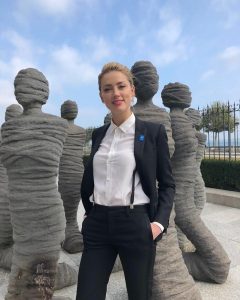 Amber Heard Instagram - Never underestimate a woman in a suit. @unitednationshumanrights