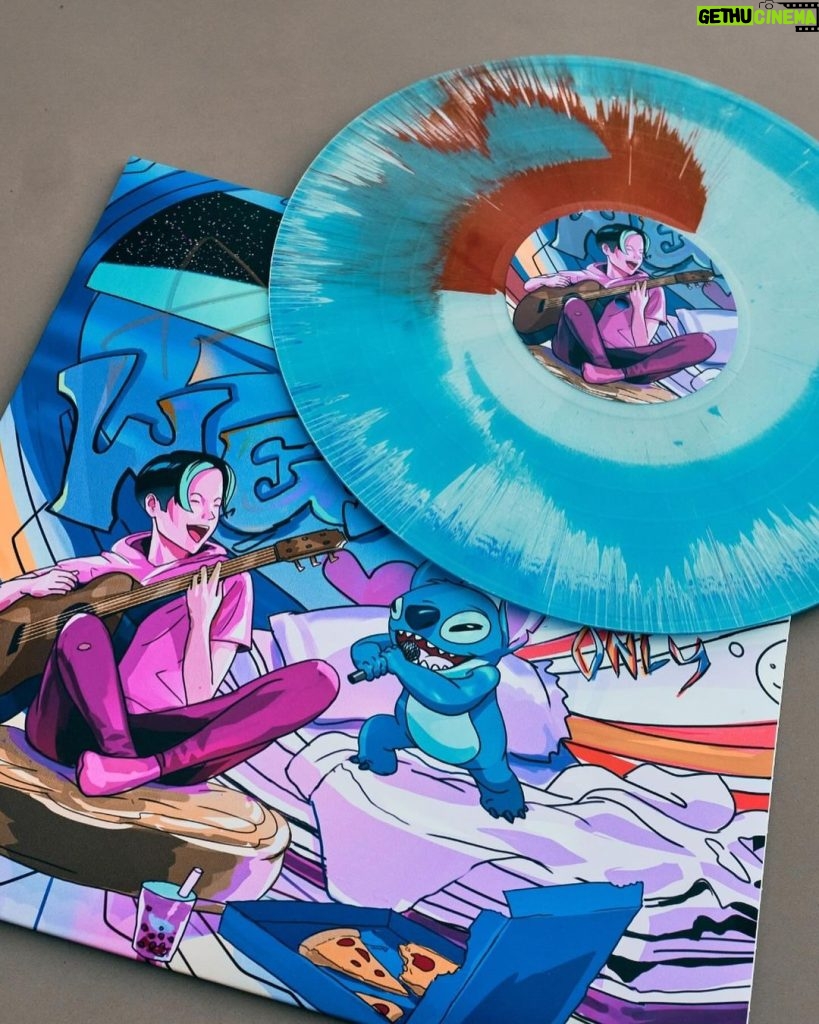 Amber Liu Instagram - I’m so excited to share with everyone my 1 of 1 vinyl for #DisneyCreate100 featuring my music from the “No More Sad Songs” Project as well as my unreleased track ‘Dusk Till Dawn’🎶✨The artwork was drawn by my good friend @anthony_francisco_art and is inspired by my favorite Disney movie, Lilo & Stitch! The auction for this piece ends OCT 30th and all proceeds go to Make-A-Wish 😊 show some love and remember, WEIRDOS ONLY 🧡💙 Visit @disneystyle to take part inthe Disney Create 100 auction.