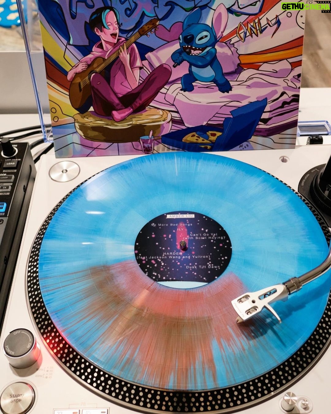 Amber Liu Instagram - I’m so excited to share with everyone my 1 of 1 vinyl for #DisneyCreate100 featuring my music from the “No More Sad Songs” Project as well as my unreleased track ‘Dusk Till Dawn’🎶✨The artwork was drawn by my good friend @anthony_francisco_art and is inspired by my favorite Disney movie, Lilo & Stitch! The auction for this piece ends OCT 30th and all proceeds go to Make-A-Wish 😊 show some love and remember, WEIRDOS ONLY 🧡💙 Visit @disneystyle to take part inthe Disney Create 100 auction.