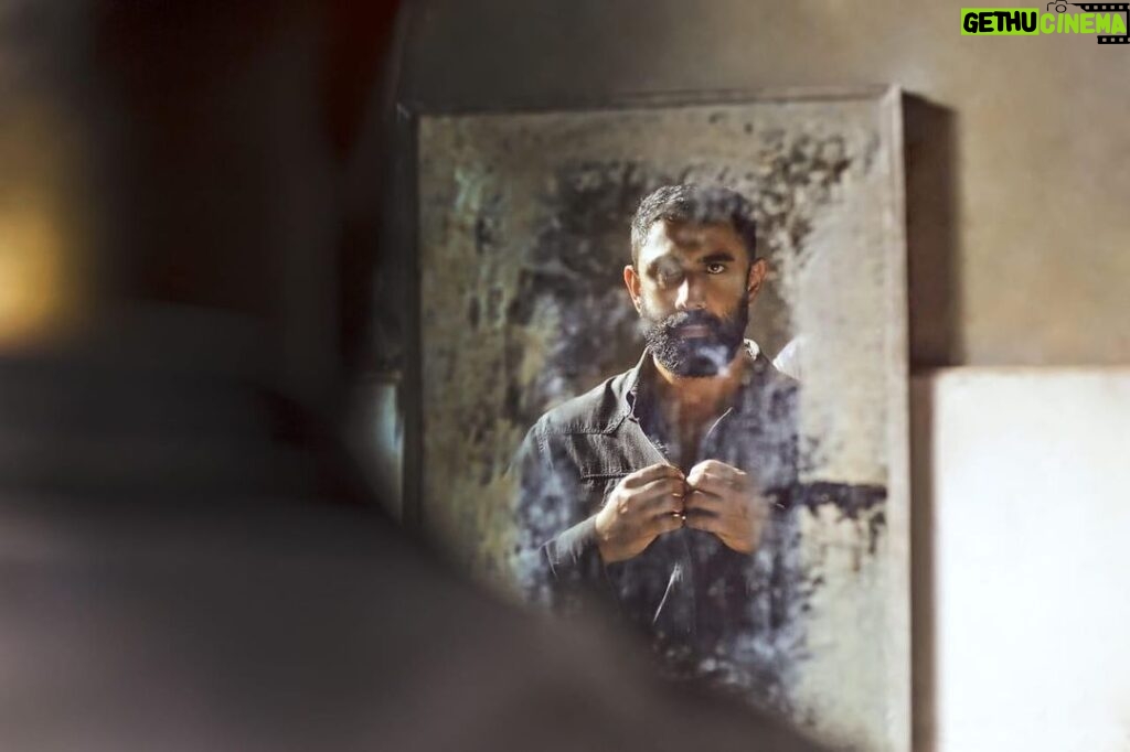 Amit Sadh Instagram - This is my favorite image from the second season. Not sure if you see it my way but, there is a connotation that I have for it. Look at the dust or noise in the mirror. It is like Kabir is getting ready to clear all the noise surrounding him. It can be the guilt of harming Meghna. This image is not merely about buttoning the shirt up and getting out of jail. It is a reflection of putting things back in order or trying to bring some sense of owning up to the mistakes. @breatheamazon @primevideoin @plabita.manu
