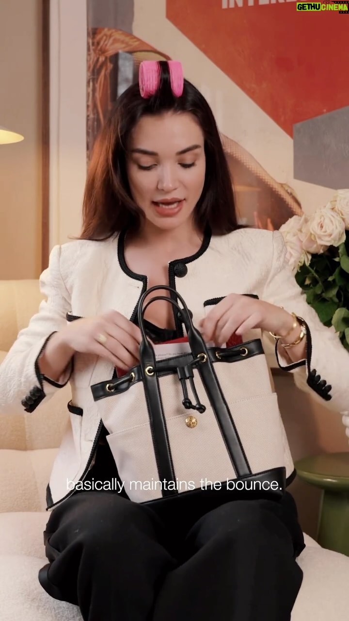 Amy Jackson Instagram - The ultimate Mary Poppins bag. If you haven’t got a bouncy blow-dry roller in your goodie bag are you even from Liverpool? Find out why I always carry my 90s film camera with me, and never leave my focus tablets at home 🫣. See what other hot essentials I can’t live without (spoiler it does include poo poo bags. The glamour) in this edition of what’s in my @veronicabeard Goody Bag. #MyVeronicaBeardBag #SpottedinVB #VeronicaBeard