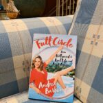 Andrea Barber Instagram – Brb, gonna read my memoir about my life thus far on the couch that I grew up on 📖💙 Full Circle is out on November 12 and I cannot wait to share it with you!! Click the link in my bio to pre-order ✨