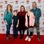 Andrea Barber Instagram - I had a blast at iHeartRadio’s Jingle Ball hanging out with Makenna and her wonderful family, who I met thanks to @hyundaihopeonwheels, Make-a-Wish, and @iheartradio. 🩷🎄🎁 Makenna, you were the highlight of my evening and I will smile every time I look at our photos! Thank you for being so kind and sweet. And thank you for being our #1 Full House fan! 🏡 #iheartjingleball Hair & makeup by the lovely @sabrinaozuna 💄💇🏻‍♀️ Kia Forum
