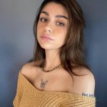Andrea Russett Instagram - why does this look like a school photo 🫢 lmfaooo scroll if ur brave… i give to u, my most cursed school photos ❤️ choose ur fighter