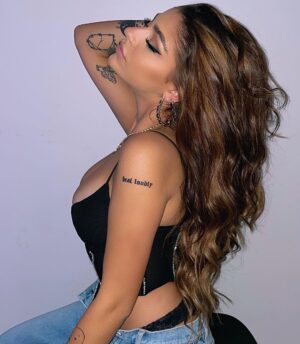 Andrea Russett Instagram - small tits, big hair 💘 TICKETS TO MY LIVE SHOWS ARE ON SALE TOMORROW AT 10AM. set ur alarms hunny buns. i wanna see u there.