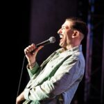 Andrew Schulz Instagram - CALGARY thank you ❤️. When people bring their own seats to the show that’s special. 🙏 The @greatoutdoorscf was 🤌🔥💪 #TheLifeTour Beautiful pics @chifftie & @sydneybuttersphoto Calgary, Canada