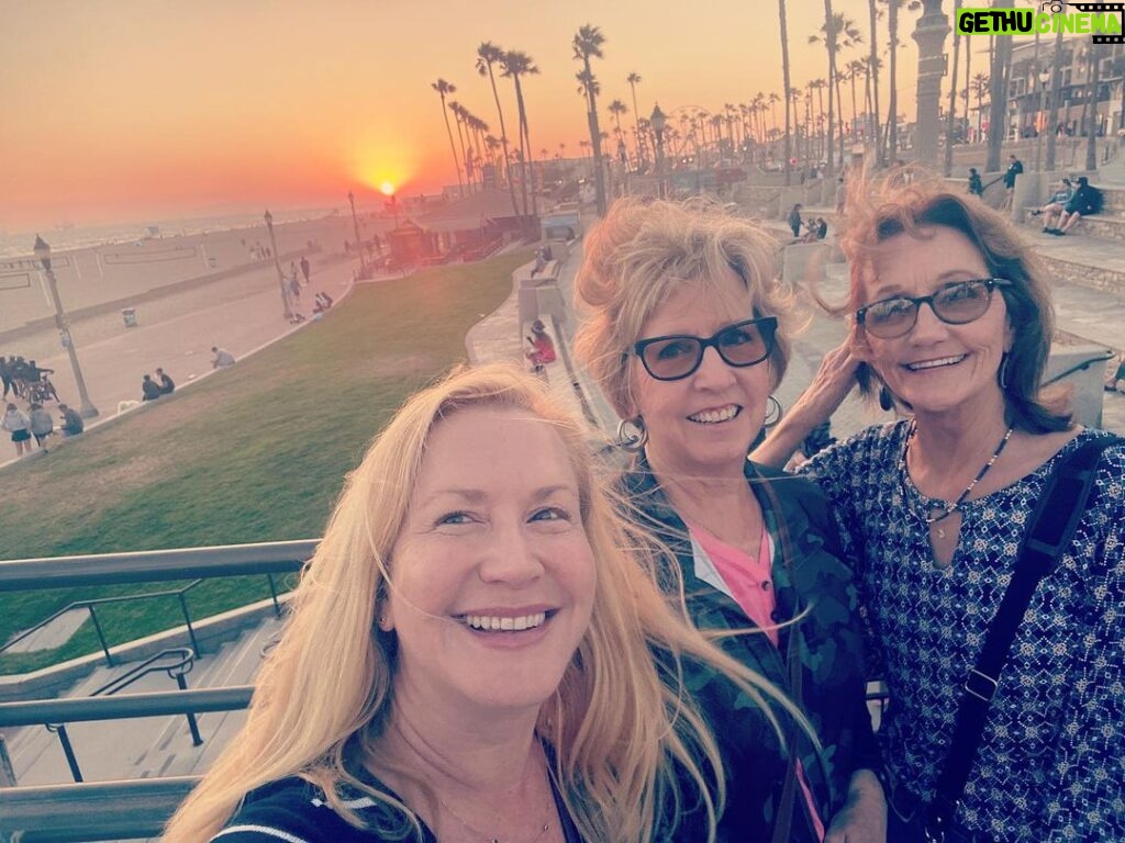 Angela Kinsey Instagram - Missing my sisters already! So thankful for these last ten days I got to spend with them. Billie, I’m so happy we got to go to @rogueptwellness with you and meet the awesome people who have become your online community this past year. Janet, I’m so glad we got to play tennis together! And my heart is so full that we got to play board games and ping pong with my kids and just sit and visit on the porch. And thanks to my husband, for listening to us talk about hummingbirds for 1/2 an hour one night and for feeding us all! 😂❤ (And Billie and Janet, I know you are wondering of all the photos we took together why would I post this one but I just loved this moment. The wind had kicked up and was blowing our hair like crazy and I was trying to get this selfie before the sunset disappeared and we were cracking up and it just makes me so happy when I look at it. Love you both so much! 🥰)