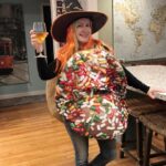 Angela Kinsey Instagram - How many years can you be donuts and coffee for Halloween? The answer is… 7 years and still going! Also, second to last picture… why am I holding a lint roller?❤️🎃🍩☕️