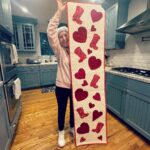 Angela Kinsey Instagram - Valentine’s Day table runner sewn by my Momma! Thanks Mom! I love it! ❤️ (I get so excited when I get a package from her because it’s always something fun and homemade!)