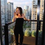 Angela Kinsey Instagram – Here’s a throwback to my dark hair and the view from my apartment in Vancouver while I filmed @hatersbackoff ! I’m so excited to go back to Vancouver this weekend with @msjennafischer for the @jflvancouver comedy festival! Yay! Office Ladies hitting the road! ❤️🚙✈️
