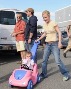 Angela Kinsey Instagram - #tbt Going on a walk with my daughter on my lunch break on the set of The Office. ❤️ (Angela Martin blouse paired with Angela Kinsey jeans & sneakers! 😂)