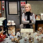 Angela Kinsey Instagram - How many cat figurines can one woman have?? 😼Today on @officeladiespod it’s Garage Sale! The Dunder Mifflin folks are selling all kinds of random stuff and Dwight is on a mission to make the best trade plus Michael proposes to a Holly!! We break it all down and share behind the scenes stories! Link in bio to listen! ❤️🎙️