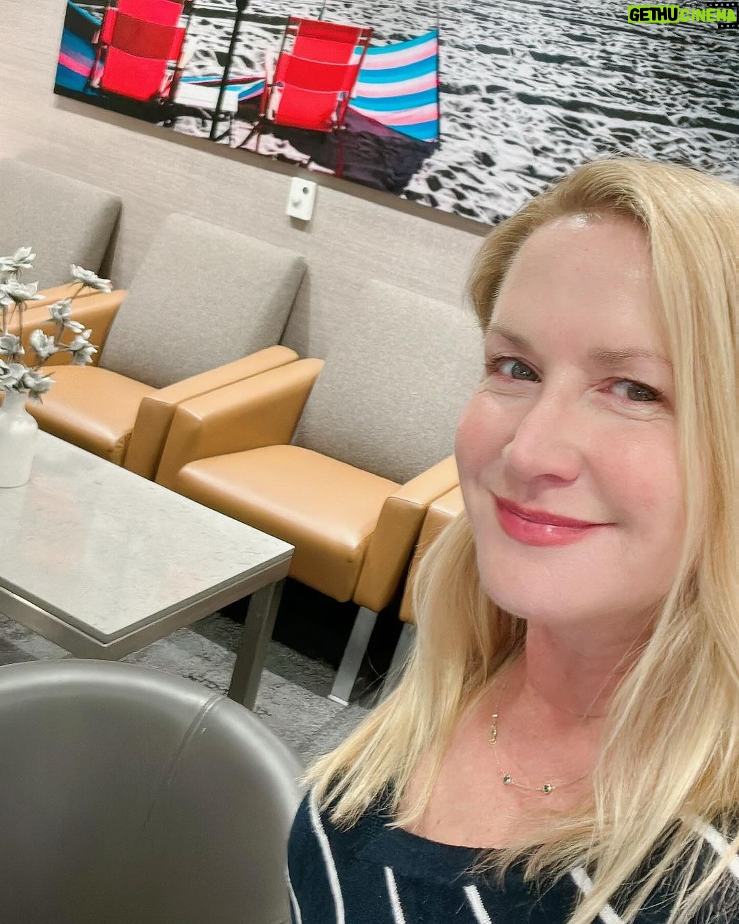 Angela Kinsey Instagram - Travel day lipstick is @lorealusa Blushing Berry. #590. Hi from @flylaxairport . The man sitting next to me is napping barefoot. I am worried he might miss his flight. Busy body me wants to tap his shoulder…what do I do??😬✈️