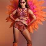 Anitta Instagram - Alô, @imperioserrano 🩷🧡 The Little King of Madureira! That’s how the samba school Império Serrano is known, my honoree today. The nickname refers to the neighborhood where it was founded in 1947, in the northern zone of Rio de Janeiro. The parade that the organization defended in 2022, called “Mangagá,” celebrated the entities of African-derived religions. In the school’s samba theme, they sing the verses: “The son of a spark is fire. If you get into the game, it’s to set it on fire.” It was this allusion to the spiritual power of the orixás that inspired the strong and warm colors of my today’s costume. Pt nos comentários São Paulo, Brazil