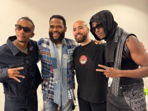 Anthony Anderson Instagram - Minding my business in Saudi and look who I bump into. @postmalone @amirkingkhan I walk into a dressing room and @shaolindaillest and crew started chanting “whoop Dat trick” Our art is amazing. It traverses the world and connects us all! Thanks for the hook up @saud.013 and Post you put on a great f*cking show! #saudi #justakidfromcompton #huskyandhandsome #acbarbeque