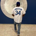 Anthony Anderson Instagram - When you’re home watching the home team! Thank you @sia_collective for making this shoe for me. Thank you @dodgers for winning a championship for me and the city! Let’s do it again! Thank you @mookiebetts for those home runs last night!thank you @joelmchale for nothing, love you brother! LETS GO DODGERS! #justakidfromcompton #huskyandhandsome #bigzaddy #acbarbeque Dodgers Stadium