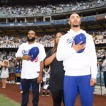 Anthony Anderson Instagram - Just came across these photos again. My dad used to take me and my brothers to the dodger games as kids to see a Fernando Venezuela, Steve Garvey, Mike Davis, Steve Sax, Pedro Guerrero, Alejandro Pena, Oral Hershiser, Ron Cey, Tommy Lasorda and now I’m friends with @mookiebetts I’ve thrown out the first pitch and I have my own @dodgers World Series Ring! Thanks dad for all the memories! Here’s to bleeding Dodger Blue! #justakidfromcompton #huskyandhandsome #bigzaddy #acbnrbeque