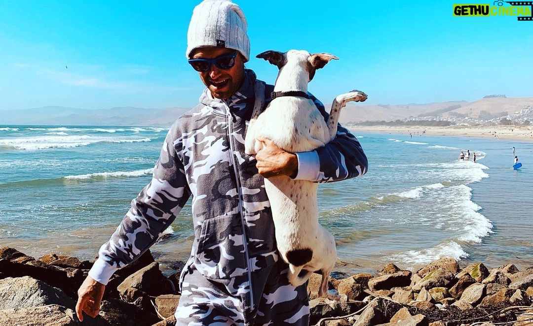 Antony Starr Instagram - Gotta get home so I can get away from home again…. Also my dog needed rescuing. From rocks, cos she’s a city girl. And yes. I am fashion in a grey camo onesie. #sosobrave #fukfashion #turdrescue #maradonna #vanlife