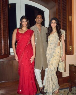 Arjun Rampal Instagram - Celebrating Ganesh Chathurthi with my lovelies Swipe for a surprise 
Wearing @jade_bymk 
Shot by @throwbakc #ganpatibappamorya