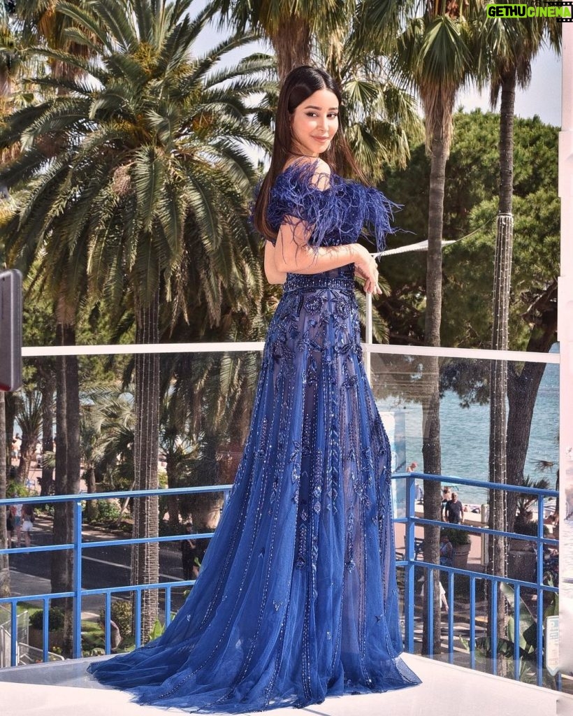 Aseel Omran Instagram - Minutes before hitting the carpet 💙 Stylist: @cedrichaddad Dress: @zuhairmuradofficial Jewelry: @marli Photography: @ranifawazofficial #Cannes #CannesFilmFestival @lorealparis