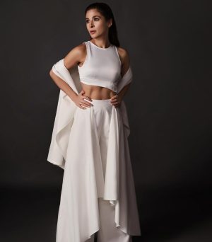 Ayesha Omar Instagram - Activate your Chakras with this all white sustainable look featuring the “Chakra” sleeveless hooded coverup (can be ordered in black also and with sleeves) and the “Hava Havai” pants in white from @ayesha.omar.style.studio “The Style Movement”. All seperates available to shop now! Website goes live at 9 pm tonight but you can start dm-Ing @ayesha.omar.style.studio for immediate orders. 
💪🏼💪🏼💪🏼
👀👀
🤍

Hair & Makeup: @irhyanthomas 
Photography: @iumairbinnisar 
Skincare: @ayesha.o.beauty 
Jewelry: @sundustalpur
__________
#AyeshaOmar #AyeshaOStyleStudio #SustainableFashion #FashionRevolution #EleganceRedefined #DiscoverYourStyle #AyeshaOmarStyleStudio 
#AOStyle #TheStyleMovement 
#allwhite