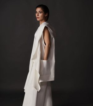 Ayesha Omar Instagram - Activate your Chakras with this all white sustainable look featuring the “Chakra” sleeveless hooded coverup (can be ordered in black also and with sleeves) and the “Hava Havai” pants in white from @ayesha.omar.style.studio “The Style Movement”. All seperates available to shop now! Website goes live at 9 pm tonight but you can start dm-Ing @ayesha.omar.style.studio for immediate orders. 
💪🏼💪🏼💪🏼
👀👀
🤍

Hair & Makeup: @irhyanthomas 
Photography: @iumairbinnisar 
Skincare: @ayesha.o.beauty 
Jewelry: @sundustalpur
__________
#AyeshaOmar #AyeshaOStyleStudio #SustainableFashion #FashionRevolution #EleganceRedefined #DiscoverYourStyle #AyeshaOmarStyleStudio 
#AOStyle #TheStyleMovement 
#allwhite