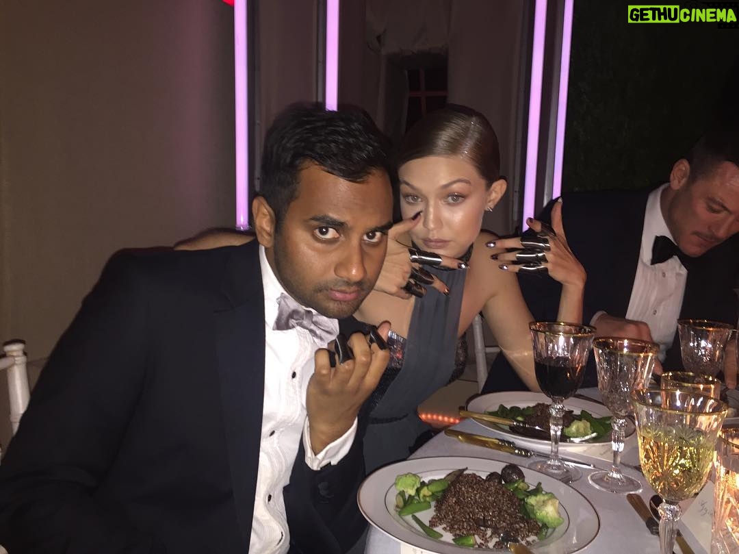 Aziz Ansari - 65.9K Likes - Met Ball post. Robot knuckles courtesy @gigihadid/@tommyhilfiger.