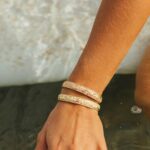 Bethany Hamilton Instagram - Stoked to announce the official launch of the @maecargo x @beautifullyflawedfoundation 3-piece jewelry collection — inspired by faith, Hawaiian lifestyle, and the beauty in flaws! 🌊 🌺 This beautiful line includes an adjustable ring, adjustable bracelet, and easy clasp necklace, all created with the adaptive needs of our Beautifully Flawed Retreat attendees in mind. Over the past few months, Kate, the owner of Mae Cargo, has poured her heart and soul into creating these beautiful pieces, capturing the essence of our retreats for those with limb difference to transform it into wearable art. Not only are these pieces gorgeous and handcrafted with the highest quality to withstand sweat, water, and the ocean, but they serve a greater purpose as well: The purchase of this line directly helps keep our mission of providing hope to overcome through Jesus. By purchasing one or more of these Beautifully Flawed collection pieces, 15% of each order goes back to our foundation to help support our programs for young women and men with limb difference. We are so grateful for Mae Cargo, this special partnership, and couldn’t be more excited for young women to feel adorable wearing this adaptive jewelry line. Link in the @beautifullyflawedfoundation profile to shop now and learn more about the collection! 📷 @taliapasheyphoto #MaeCargo #BeautifullyFlawedFoundation