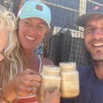 Bethany Hamilton Instagram - Micah trying to sneak a taste of our delicious blended iced coffee 😋 #ad Adam and I enjoy our coffee & this recipe for two definitely hits the spot when it’s hot out! 1/2 cup of frozen coconut 🥛 1 cup of ice 1 cup of chilled toxic free coffee (we did 4 shots of espresso!) 1 packet of Primal Kitchen Collagen Peptides (2 if you want an extra protein boost) 3 Tbsp or so of honey (or maple syrup if you prefer) 1/2 tsp of vanilla 1 pinch of salt Add the ingredients to your blender and blend thoroughly. I hope this fills your craving for a cool summer treat! 😎 @primalkitchenfoods #bethanystylehealth #primalkitchen #biggerbite
